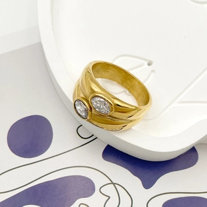14K gold plated stainless steel chunky ring featuring dual white cubic zirconia stones