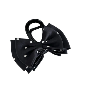 Polka dot bow hair claw clip in black and white fabric for elegant women hairstyles