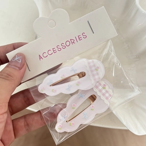 Set di fermagli per capelli a nuvola rosa con fiocchi blu e motivi floreali