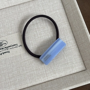 Minimalist elastic hair tie with blue acetate rectangle and France Handmade gold lettering