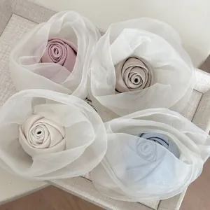 Elegant 4-piece set of pastel 3D mesh rose flower hair clips in pink beige blue white
