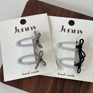 Set di quattro fermagli per capelli glitter argento con fiocchi neri e grigi fatti a mano