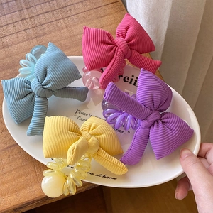 Lot de quatre chouchous câbles avec nœuds mignons en bleu rose jaune et violet