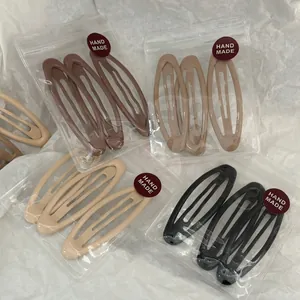 Lot de 3 pinces BB ovales minimalistes couleur thé au lait dans un emballage manuel