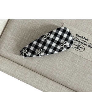 British style black and white plaid hair clip with silver bows and pearls