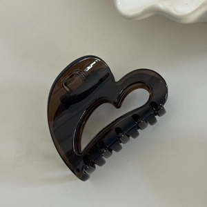 Minimalist heart shaped amber brown resin hair claw clip for elegant hairstyles