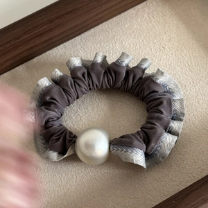 Elegant dark grey ruffled silk scrunchie with a large white pearl bead accent