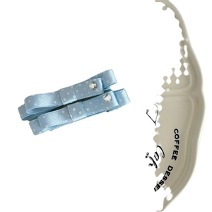 Pair of light blue polka dot bow hair clips with rhinestones on satin ribbon