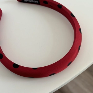 French style red satin headband with black polka dots and handmade interior woven label