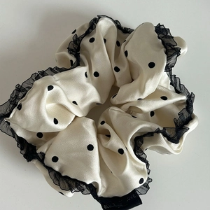 Beige polka dot scrunchie with black lace trim and silk satin fabric for women