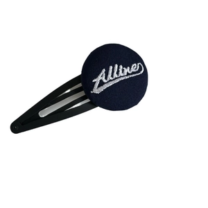 Navy blue fabric hair clip with Alline embroidery on a black metal BB snap barrette base