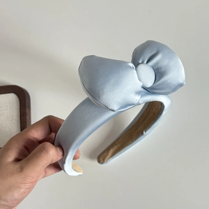 Cute light blue satin headband with large bow for washing face or makeup styling