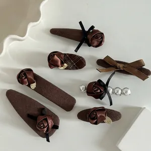 7-piece brown hair clip set with satin roses, pearl bows and vintage British style