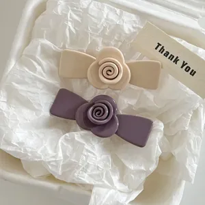 French flower acetate hair clips in cream beige and morandi purple on white paper