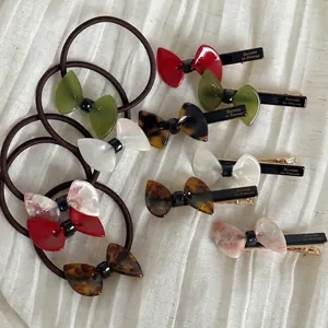 Elegant acetic acid bow hair clip and elastic hair tie set in various marble colors
