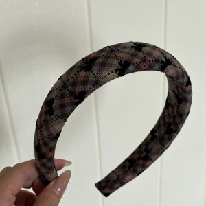 Brown plaid headband with black butterfly patterns for a sweet and vintage hair look