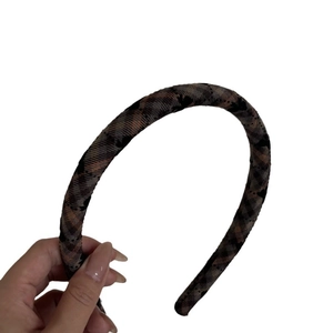 Brown plaid fabric headband for women with a classic checkered pattern and elegant style
