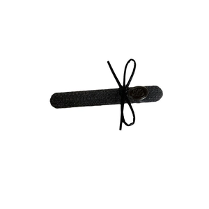 Minimalist dark gray suit fabric bow hair clip with black string and oval metal plate