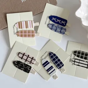 Lot de 10 barrettes à cheveux à carreaux bleus et rayures aux motifs assortis