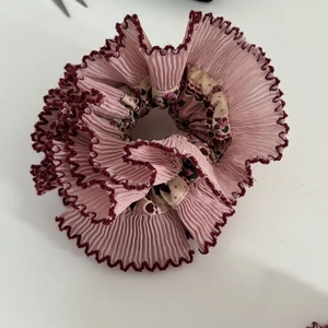 Pink layered lace scrunchie with red wavy edges and vintage floral print lining