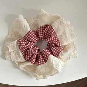 Red gingham and cream lace scrunchie with embroidery and bow details for hair styling
