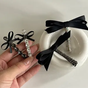 French vintage black silk bow hair clips with grey crystal accents for women