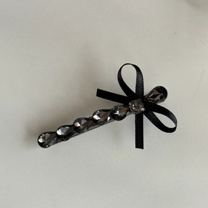 French vintage hair clip featuring grey crystal drops and a black silk bow decoration