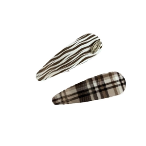 Set of two leopard and striped BB hair clips with premium acrylic and gold metal label