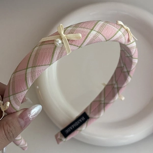 Pink and green plaid fabric headband with elegant ribbon bows and pearl details