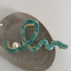 Blue marble acetate hair claw clip with gold frame and pearl detail for women