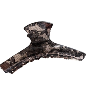 Elegant grey hair claw clip with black lace honeycomb pattern for women's hairstyling