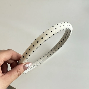 Retro black and white polka dot padded headband for women with premium fabric texture