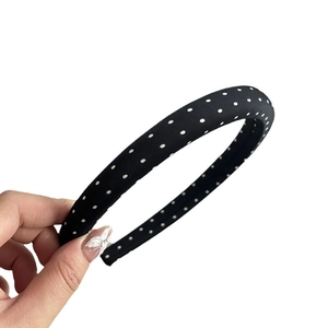 Retro black headband with white polka dots for women in elegant minimalist fabric style