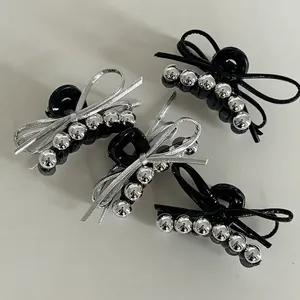 Silver bow hair claw set with metallic beads for thin hair styling and bun accessories