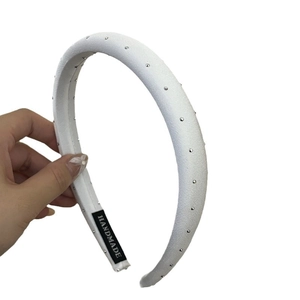 White padded headband with silver studs and handmade satin texture for women