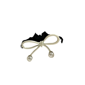 Elegant polka dot bow hair clip with cream pearls and black lace ribbons for women