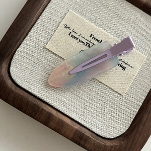 Sweet resin hair clip with colorful tie-dye patterns and metal duckbill clamp