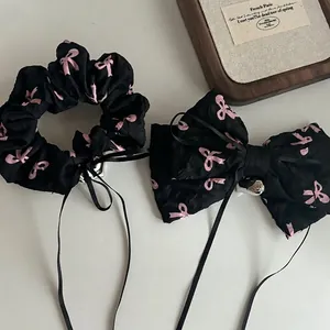 Sweet black bow hair clip and scrunchie set with pink prints and silver pendants