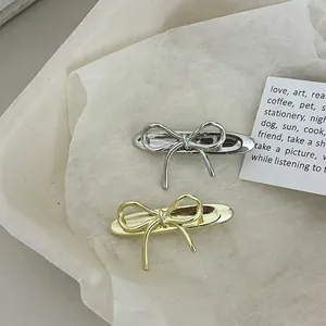 Barrettes à cheveux en forme de nœud en métal argenté et doré au fini poli miroir
