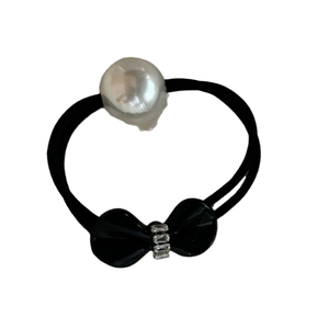 Elegant bow hair tie with large white pearl and sparkling rhinestones on black band