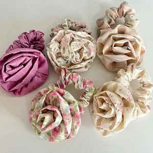 Elegant floral scrunchies with large rose design in five assorted pastel patterns