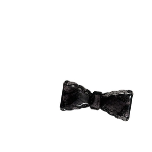 Vintage black lace bow hair clip for women with elegant mesh texture on white background