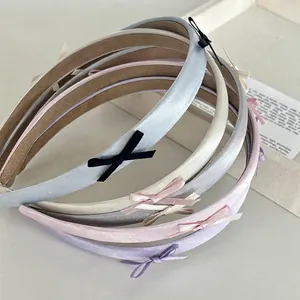 Set of satin bow headbands in soft Morandi colors for a sweet ballet aesthetic