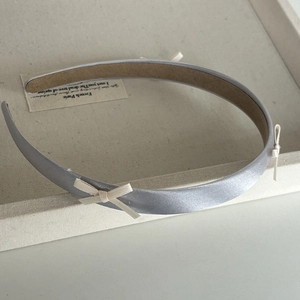Elegant silver-grey satin headband with dual cream ribbon bows for women and girls