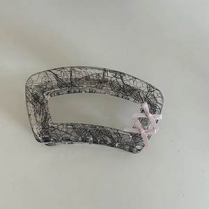 Pink lace bow hair claw clip made of clear acrylic for elegant women hair styling