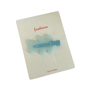 Cute light blue matte bear hair clip with metal duckbill clip on white card display