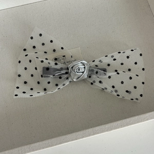 Elegant black polka dot mesh bow hair clip with a vintage silver rose centerpiece decor