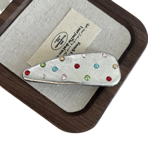 Silver teardrop hair clip with colorful rhinestones and leather texture for women