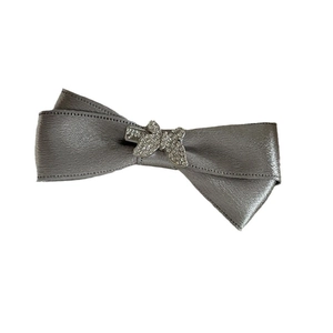 Elegant grey satin bow hair clip featuring a sparkling rhinestone butterfly ornament