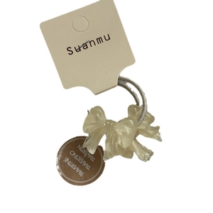 Élastique à cheveux avec nœud crème translucide et cordon argenté pour petites filles